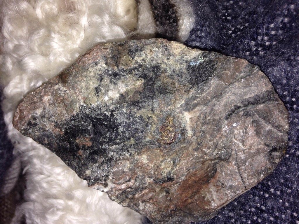 I found a cool rock, I busted it open-- peacock ore inside! Score!
